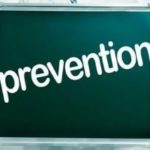 Stylish text 'prevention' on green chalkboard, highlighting HVAC leak awareness for homeowners.