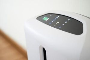 Air purifier with digital control panel, emphasizing indoor air quality improvement and health benefits.