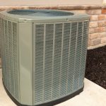 Air conditioning unit outside a home, emphasizing the importance of proper maintenance for efficient cooling and improved air quality.